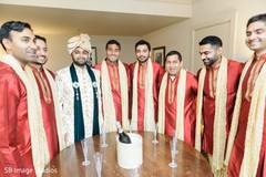 Indian groom with groomsmen having a toast. Indian groom with groomsmen having a toast.