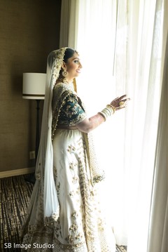 Maharani on her ceremony outfit looking out the window. Maharani on her ceremony outfit looking out the window.