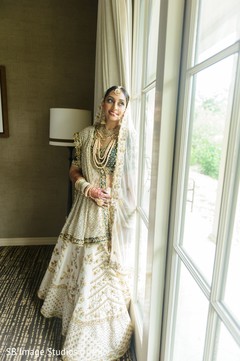 Indian bride with her Indian wedding ceremony lehenga. Indian bride with her Indian wedding ceremony lehenga.