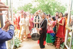 Indian Dhol player at baraat procession capture. Indian Dhol player at baraat procession capture.