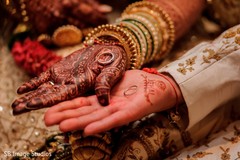 Indian couple showing their wedding bands. Indian couple showing their wedding bands.