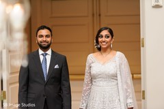 Indian bride and groom making their entrance to reception party. Indian bride and groom making their entrance to reception party.