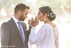 Indian couple holding their pinky fingers capture. Indian couple holding their pinky fingers capture.
