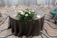 Indian couple's reception table flowers decoration. Indian couple's reception table flowers decoration.