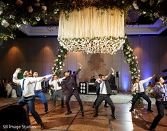 Indian groom with groomsmen reception dance. Indian groom with groomsmen reception dance.