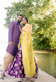 Indian couple posing next to river capture. Indian couple posing next to river capture.
