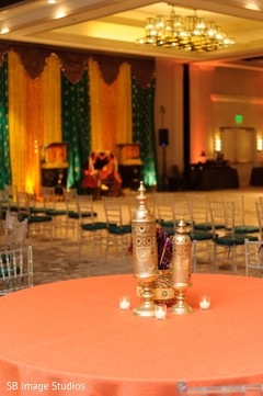 Sangeet table golden lanterns decorations. Sangeet table golden lanterns decorations.