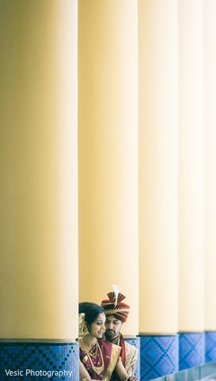 Indian newlyweds between the columns Indian newlyweds between the columns