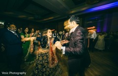 Newlywed Indian couple dancing at the reception Newlywed Indian couple dancing at the reception