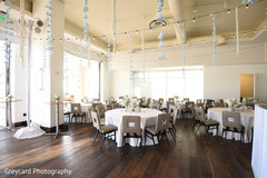 Table arrangement and decorations at saloon. Table arrangement and decorations at saloon.