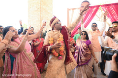 Indian groom wearing sunglasses and his baraat parade. Indian groom wearing sunglasses and his baraat parade.