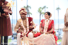 Indian couple laughing at their wedding ceremony. Indian couple laughing at their wedding ceremony.