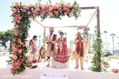 Indian couple praying during their wedding ceremony. Indian couple praying during their wedding ceremony.
