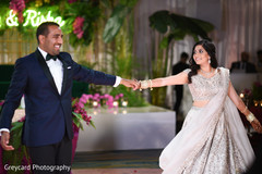 Indian bride and Indian groom starting their dance performance. Indian bride and Indian groom starting their dance performance.
