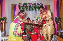 Indian bride and Raja wearing traditional attires during the rituals. Indian bride and Raja wearing traditional attires during the rituals.