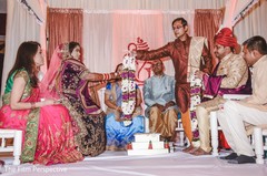 Indian bride receiving the garland during the rituals. Indian bride receiving the garland during the rituals.