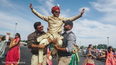 Indian groom being lifted by special guests. Indian groom being lifted by special guests.