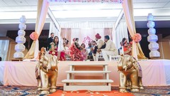 Maharani and Raja under the mandap getting married. Maharani and Raja under the mandap getting married.