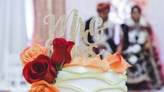 Floral decor details of the Indian wedding cake. Floral decor details of the Indian wedding cake.