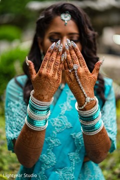 Indian bride showing her nail's art and her mehndi. Indian bride showing her nail's art and her mehndi.