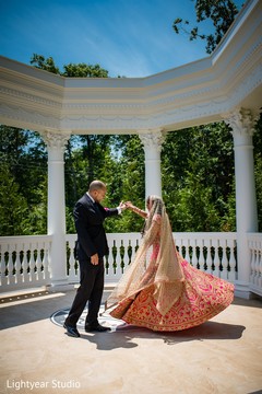 Indian bride and groom outdoors first look capture. Indian bride and groom outdoors first look capture.