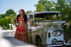 Maharani posing next to her white rolls royce. Maharani posing next to her white rolls royce.