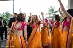 Indian bridesmaids celebrating outdoors. Indian bridesmaids celebrating outdoors.