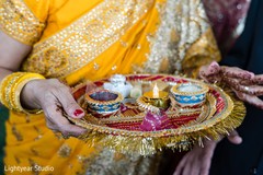 Indian relative holding the sacred items. Indian relative holding the sacred items.