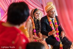 Indian couple at their traditional wedding ceremony. Indian couple at their traditional wedding ceremony.