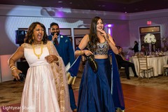 Indian wedding reception shoe game. Indian wedding reception shoe game.