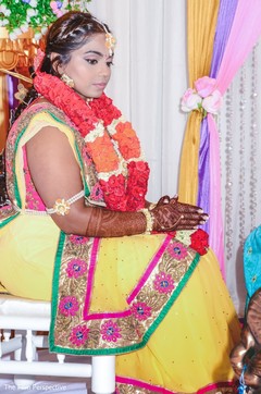 Maharani wearing the marigold lengha during the rituals. Maharani wearing the marigold lengha during the rituals.