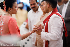 Indian couple dancing with guests. Indian couple dancing with guests.