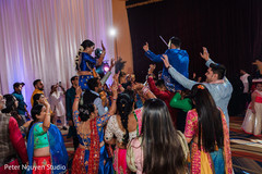 Maharani and Indian groom up on Indian relatives shoulders Maharani and Indian groom up on Indian relatives shoulders