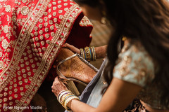 Indian relative helping Maharani put her shoes on Indian relative helping Maharani put her shoes on