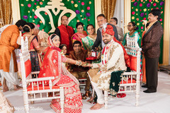 Indian couple looking at the camera for wedding picture. Indian couple looking at the camera for wedding picture.
