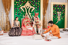 Indian couple preparing for Agni ritual. Indian couple preparing for Agni ritual.