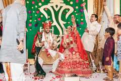Maharani greeting her wedding guests with joy. Maharani greeting her wedding guests with joy.
