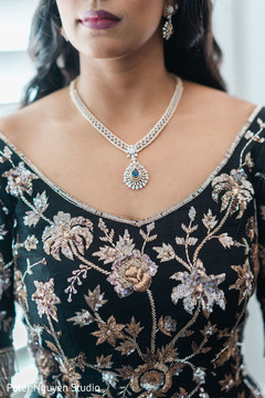 Maharani wearing a silver necklace with saphire and diamonds. Maharani wearing a silver necklace with saphire and diamonds.