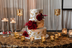 Cake decorated with roses and golden details. Cake decorated with roses and golden details.