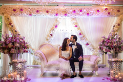Maharani and Indian groom under the coral mandap. Maharani and Indian groom under the coral mandap.