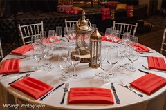 Sangeet table centerpiece bronze lanterns decor. Sangeet table centerpiece bronze lanterns decor.