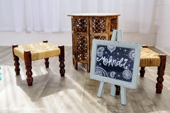 Indian wedding wooden sign and wooden seats. Indian wedding wooden sign and wooden seats.