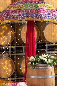 Sangeet umbrella and flowers decorations. Sangeet umbrella and flowers decorations.