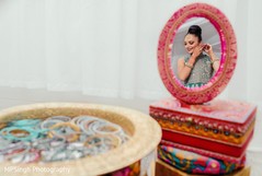 Maharani putting hon her sangeet earrings. Maharani putting hon her sangeet earrings.
