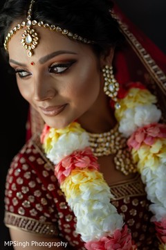 Radiant Indian bridal ceremony makeup and matha patti. Radiant Indian bridal ceremony makeup and matha patti.