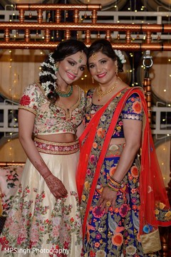 Indian bride with mother on their pre-wedding outfits. Indian bride with mother on their pre-wedding outfits.