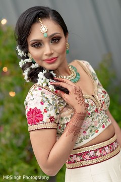 Indian bride with her hairstyle with white flowers capture. Indian bride with her hairstyle with white flowers capture.