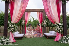 Indian bride with relative showing her mehndi. Indian bride with relative showing her mehndi.