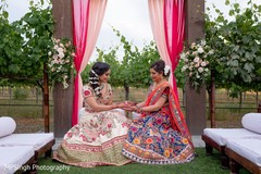 Indian bride with mother at mehndi party. Indian bride with mother at mehndi party.