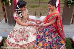 Indian bride on her ping lehenga mehndi outfit. Indian bride on her ping lehenga mehndi outfit.